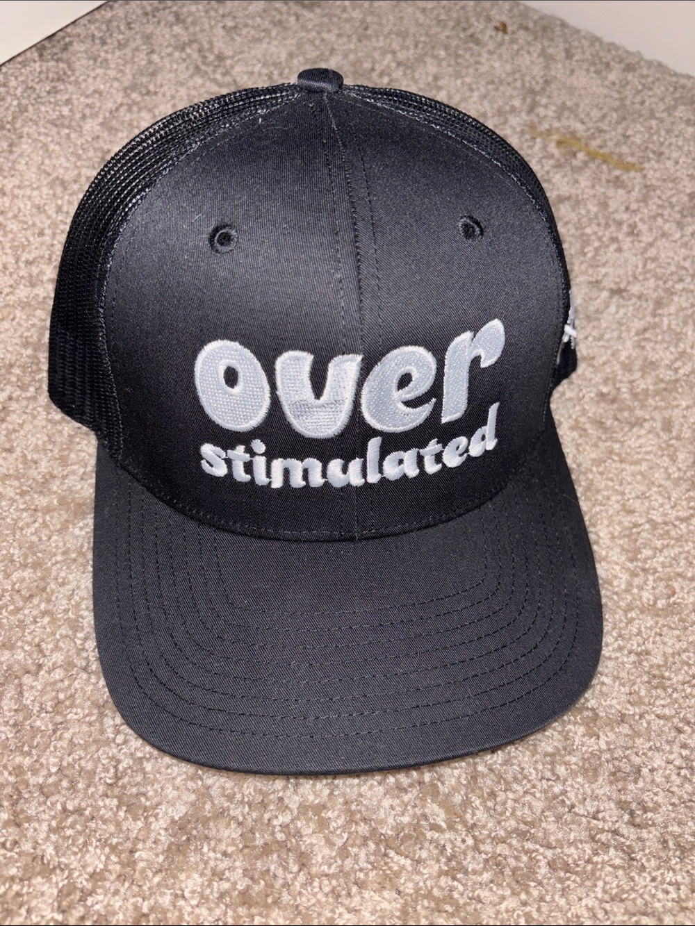 Over Stimulated Black Trucker Hat